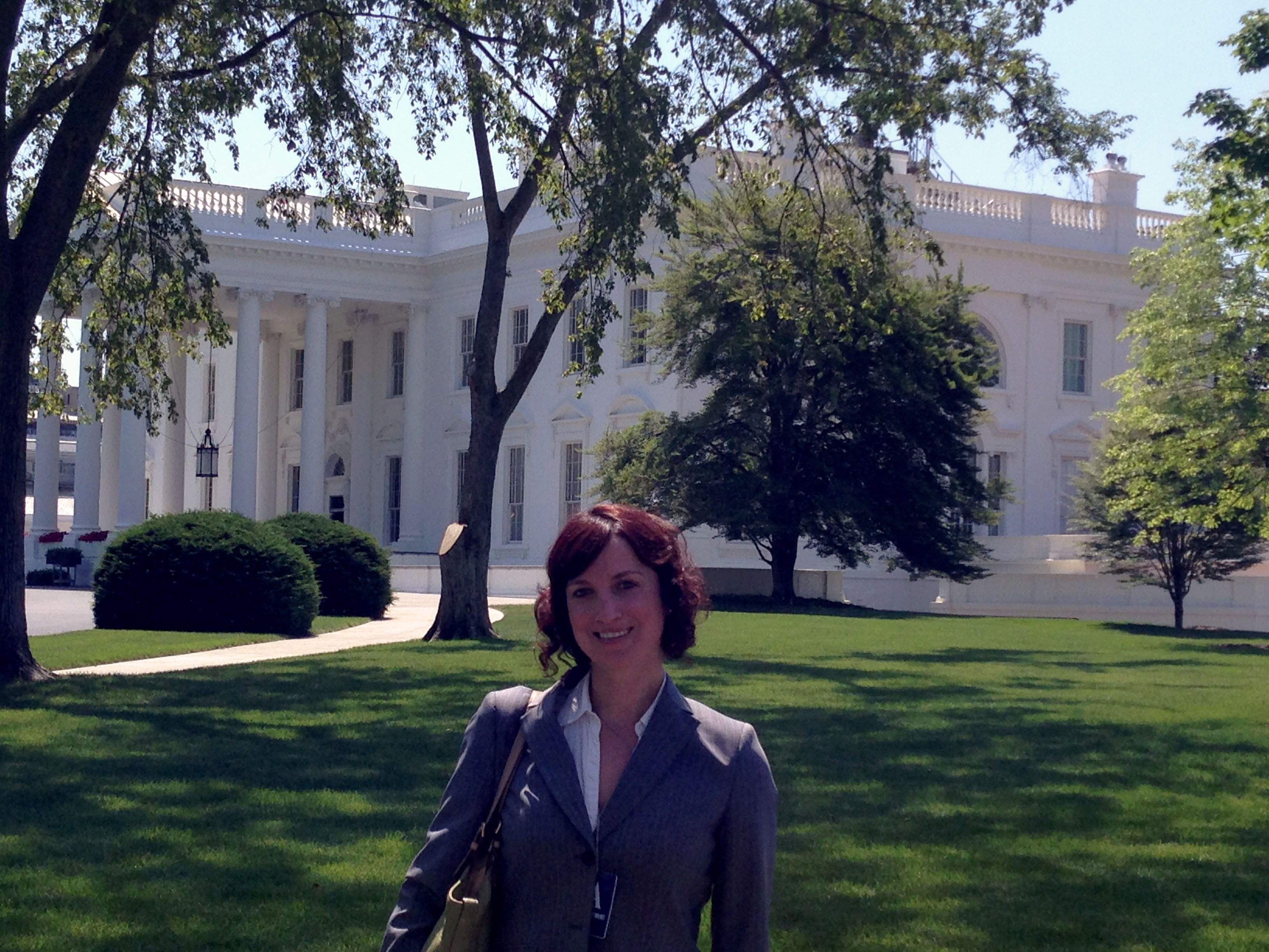 Rebecca Hamilton in front of the White House, 2014. She was invited to discuss policies for small businesses as part of the Working Families Summit.