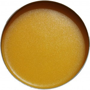 open tin of balm